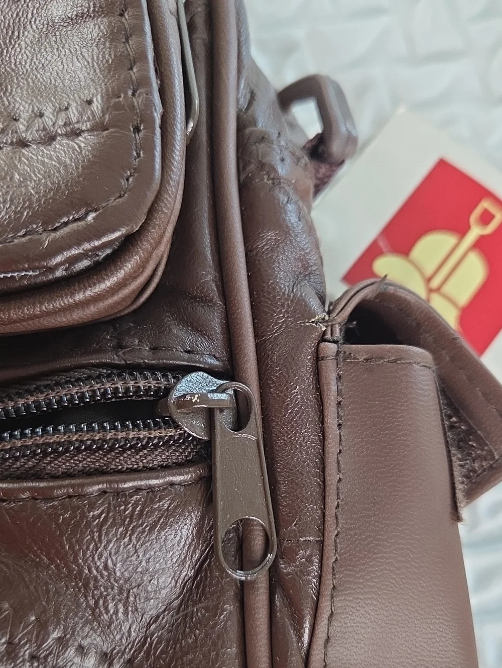 Crossbody MENS SLING BAG.Brown. English Leather PVC. RAIN RESISTANT